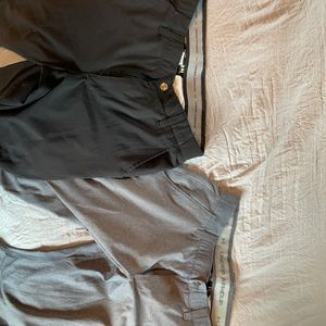 Two pairs of under armour golf pants.